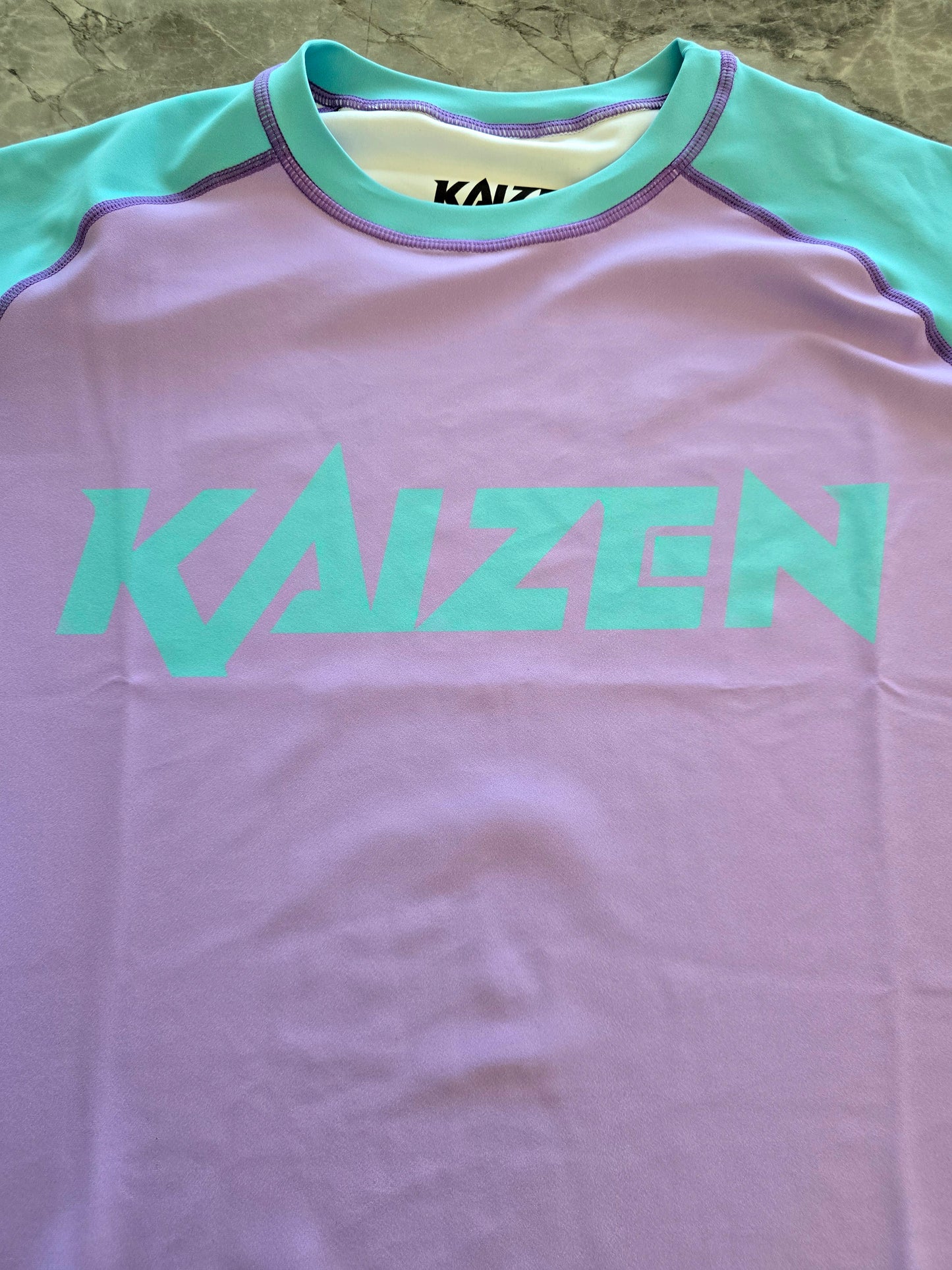 LILAC AND BUBBLEGUM ONI V2 RASHGUARD