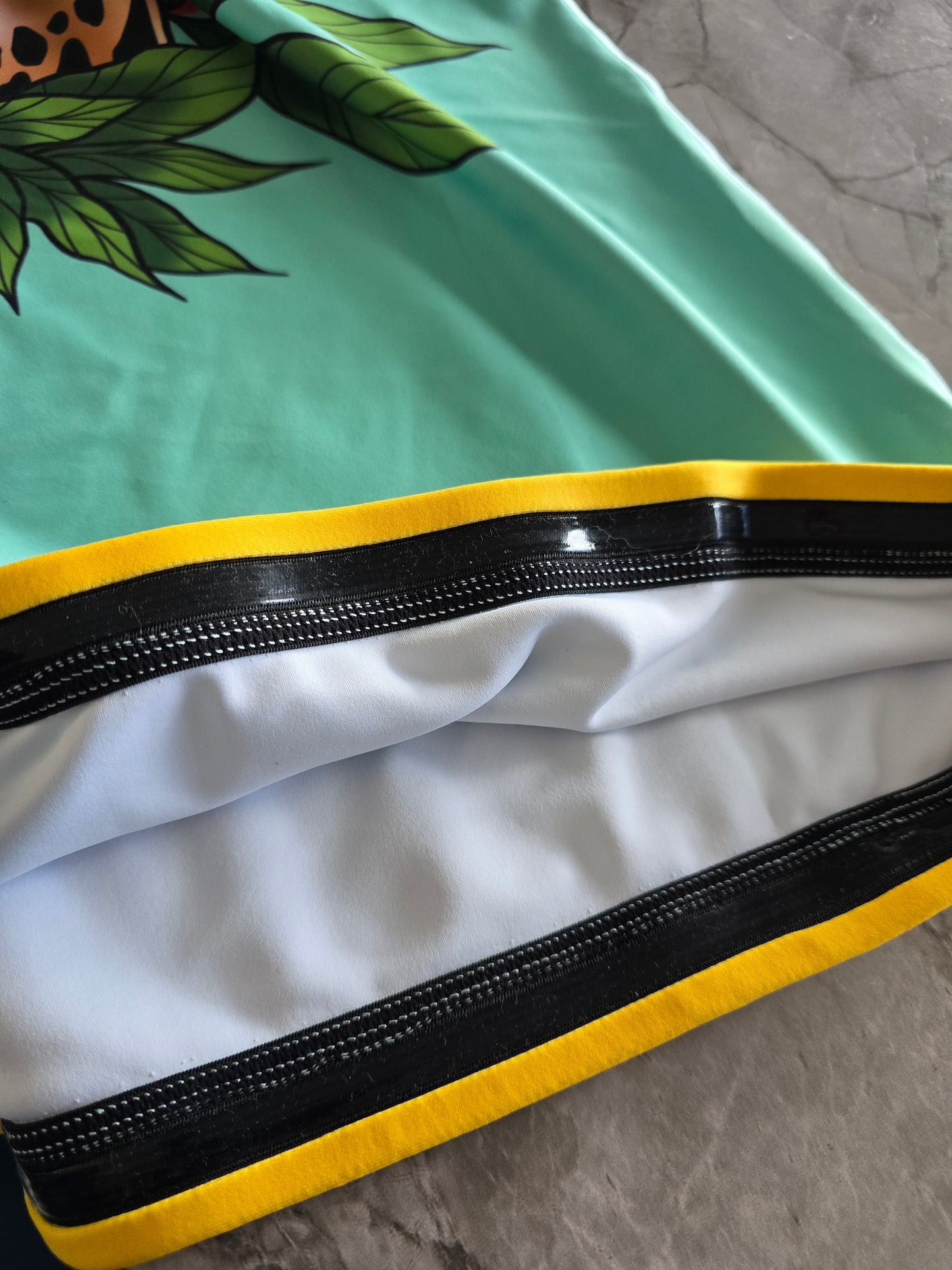 APEX TEAL AND GOLD RASHGUARD
